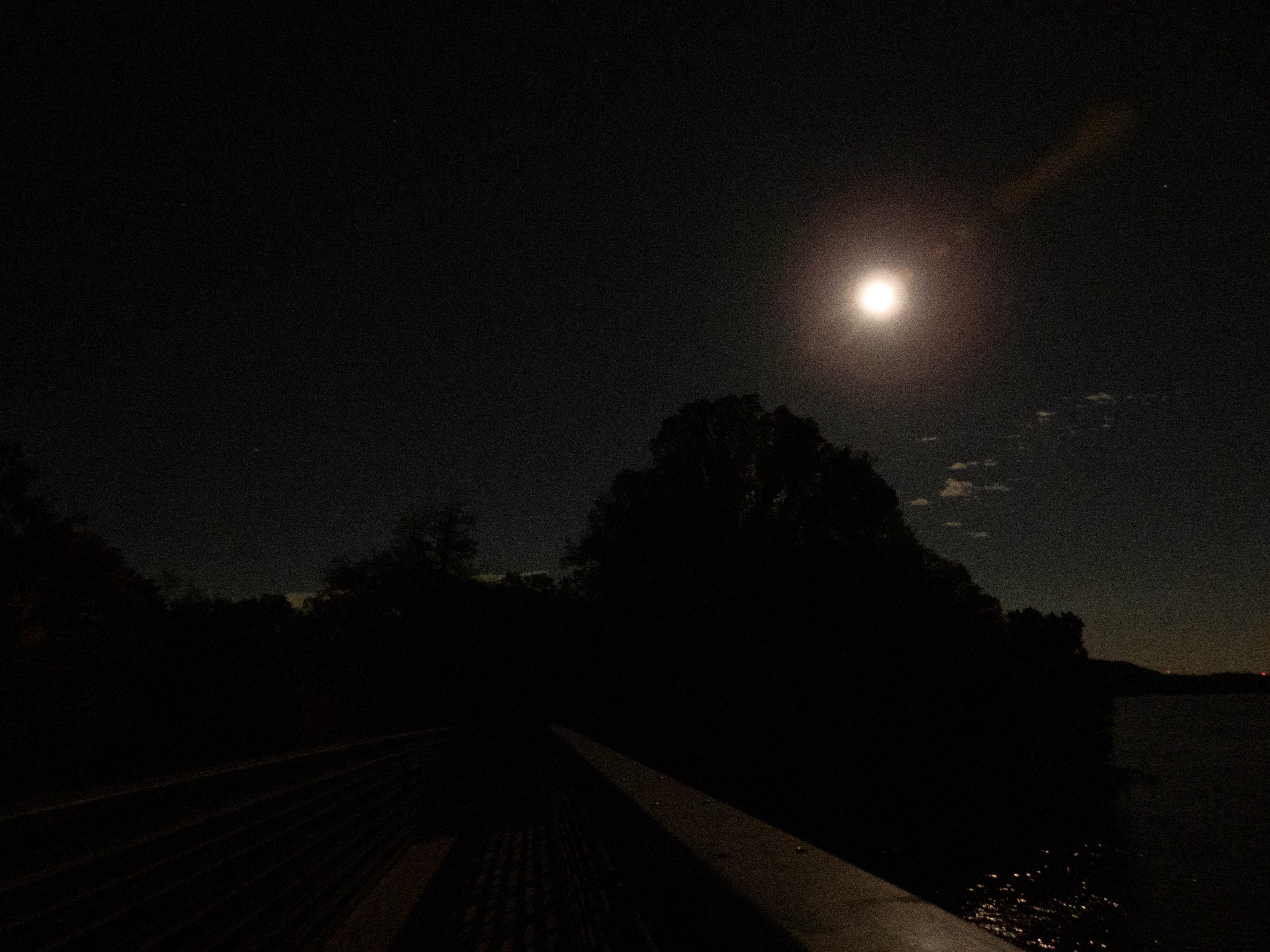 Unedited version of Moon over a bridge -- October 2025 Harvest Moon