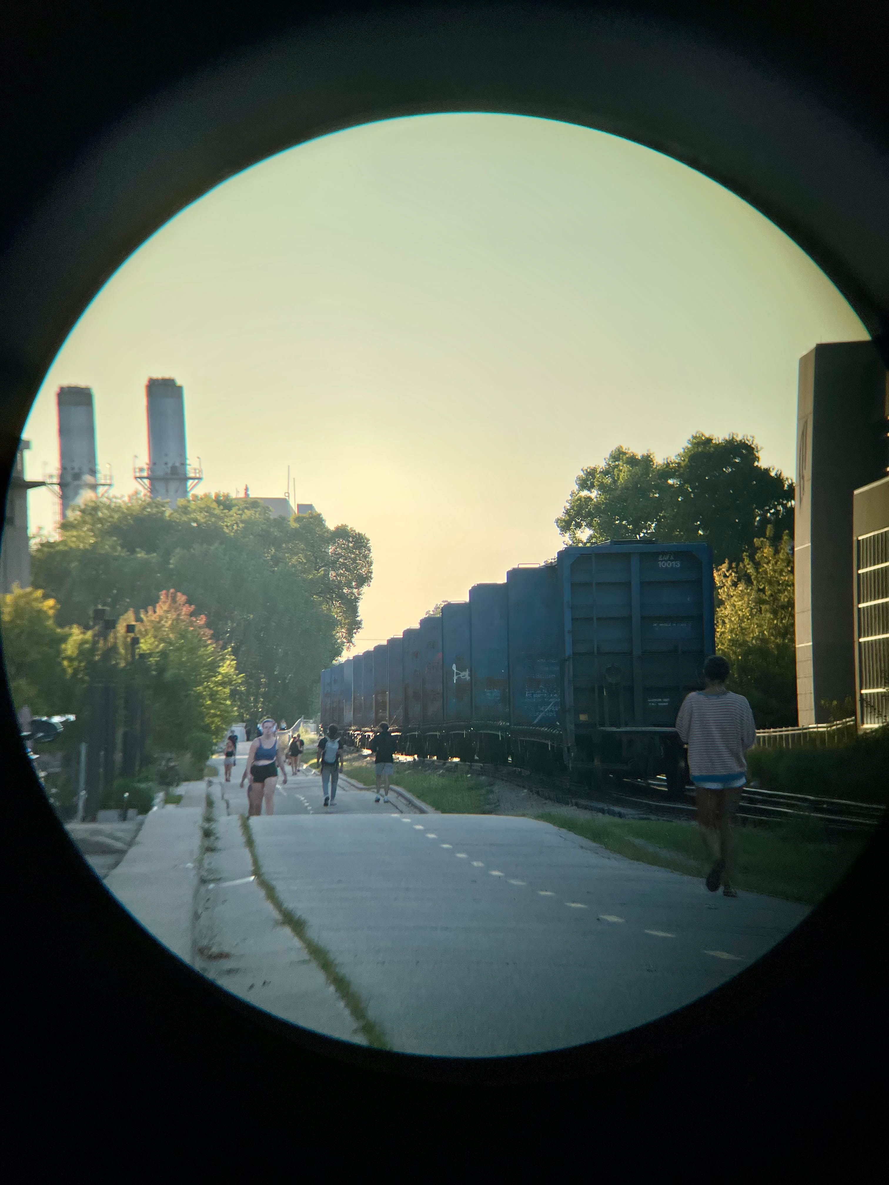 Unedited version of Picture of a path at sunset, framed using binoculars.